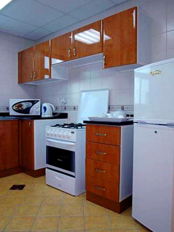 Arcadia Hotel Suites Sharjah Bilik gambar